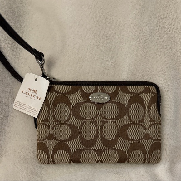 Coach Handbags - Coach Signature Brown and Cream Wristlet